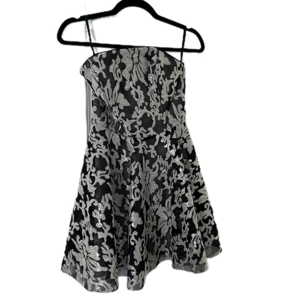 NWT never worn cocktail dress. Bebe. Size 2.